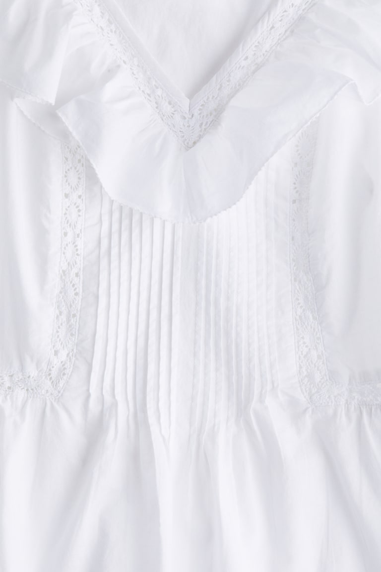 H&M Baumwolltop mit Volant Begrenzte Freigabe