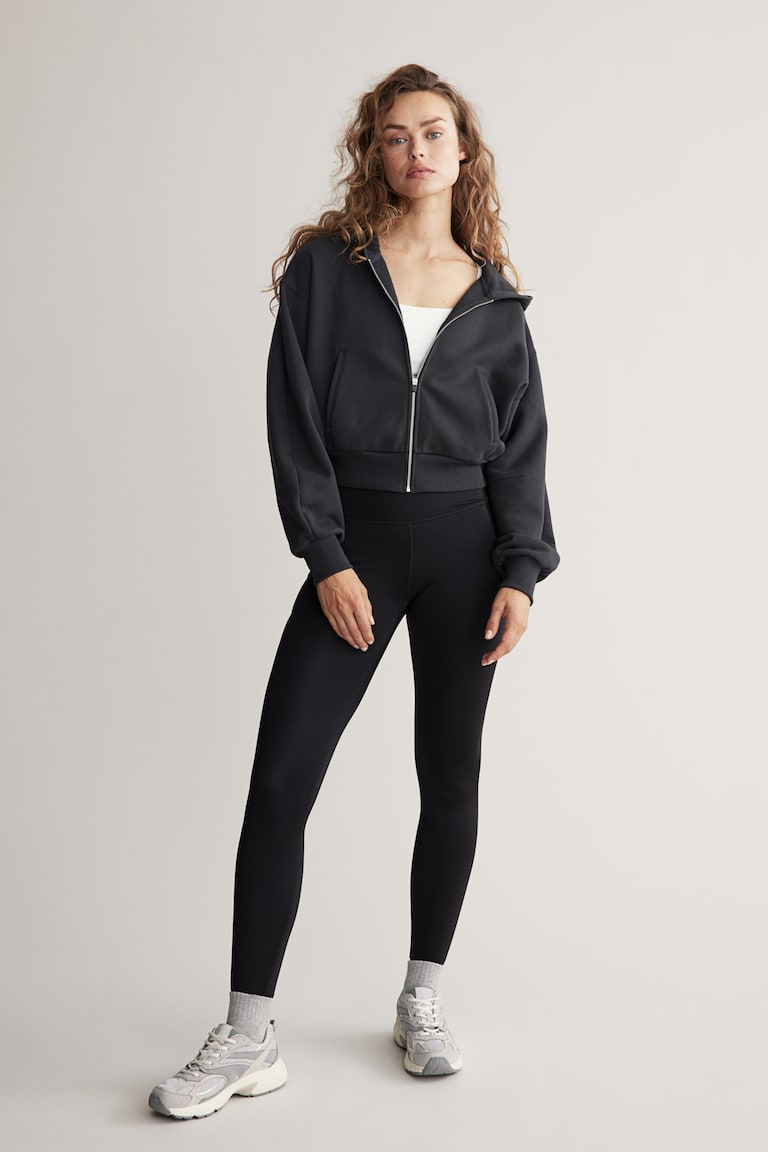H&M Sportleggings mit DryMove™ und Beintaschen Letzter Tag