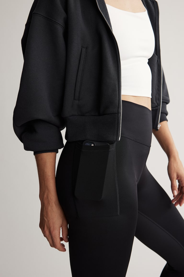 H&M Sportleggings mit DryMove™ und Beintaschen Letzter Tag