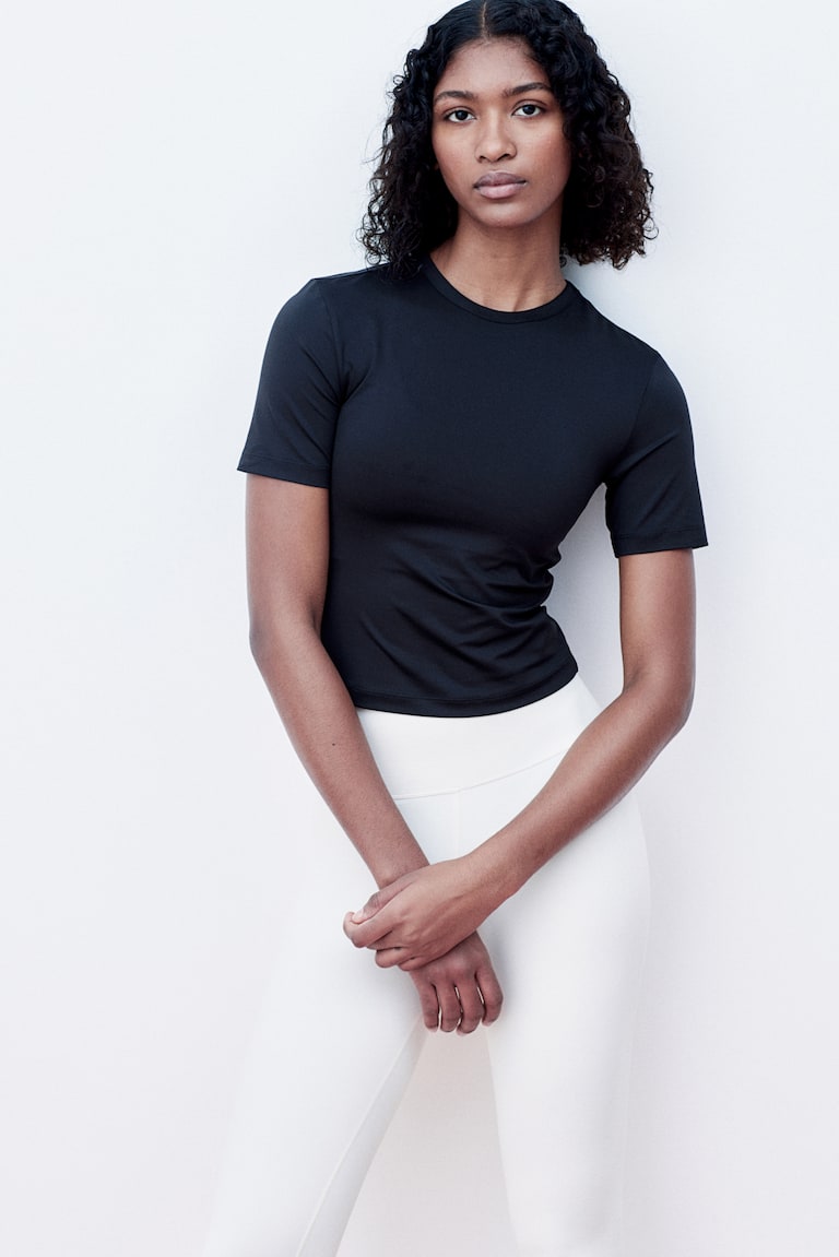 H&M Cropped Sportshirt mit DryMove™ Begrenztes Angebot
