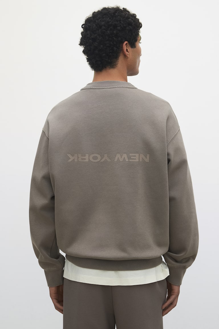 H&M Bedrucktes Sweatshirt in Loose Fit Angebote