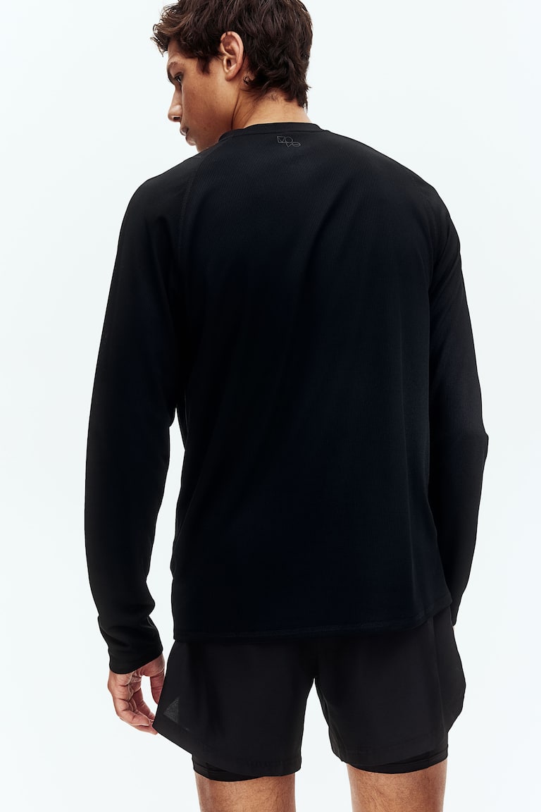 H&M Doppellagige Sportshorts mit DryMove™ JETZT KAUFEN