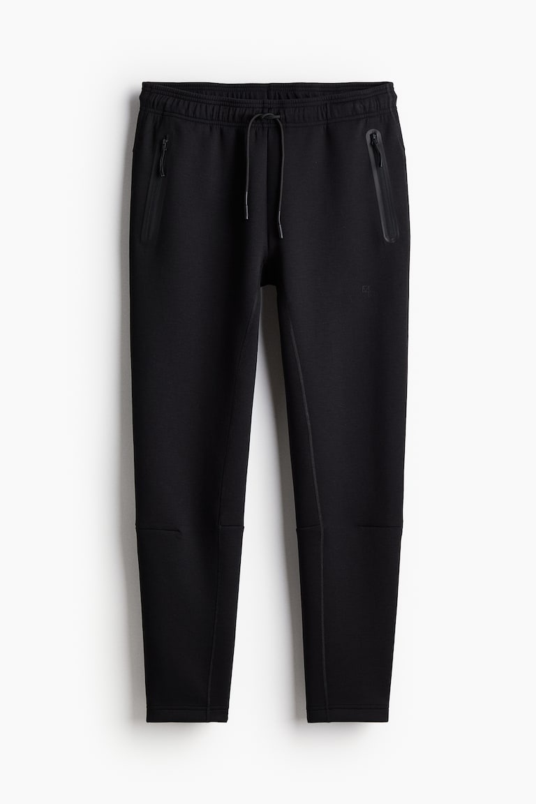 H&M Sport-Joggpants mit DryMove™ in Slim Fit Bis zu 55% Rabatt