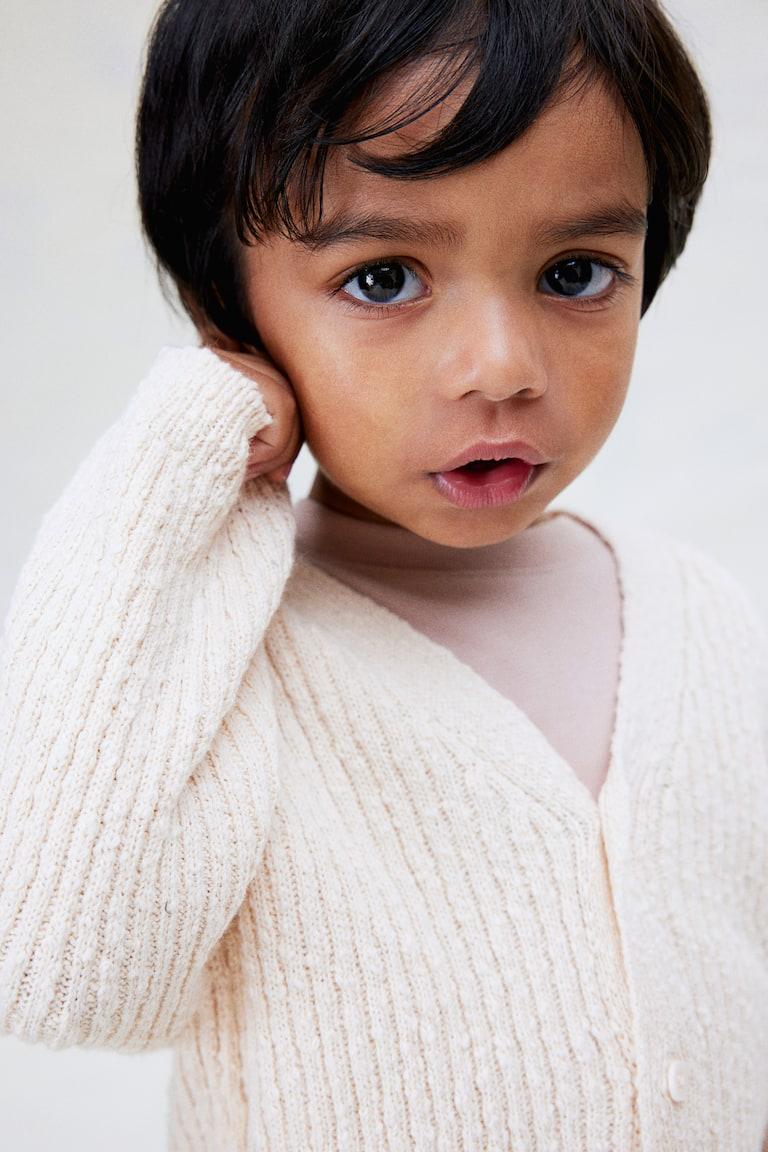 H&M Oversized Cardigan aus Boucléstrick Saisonale Angebote