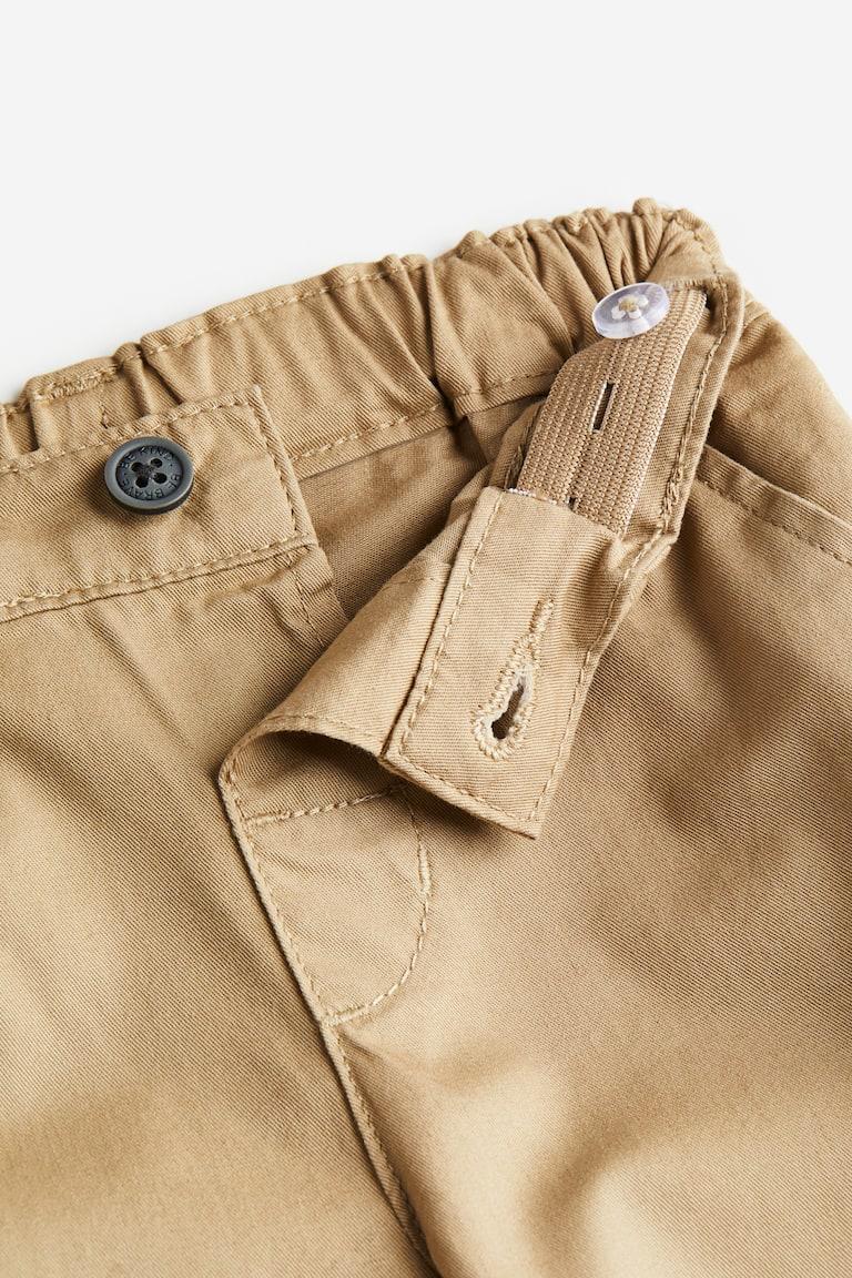 H&M Baumwollchino 50% Rabatt mit kostenlosem Versand