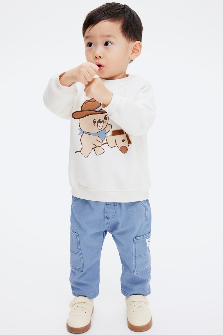 H&M Sweatshirt mit Motiv Hotsell
