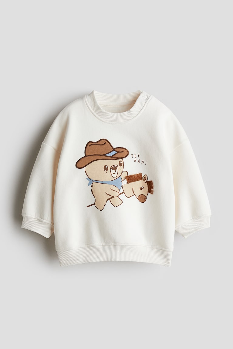 H&M Sweatshirt mit Motiv im Angebot