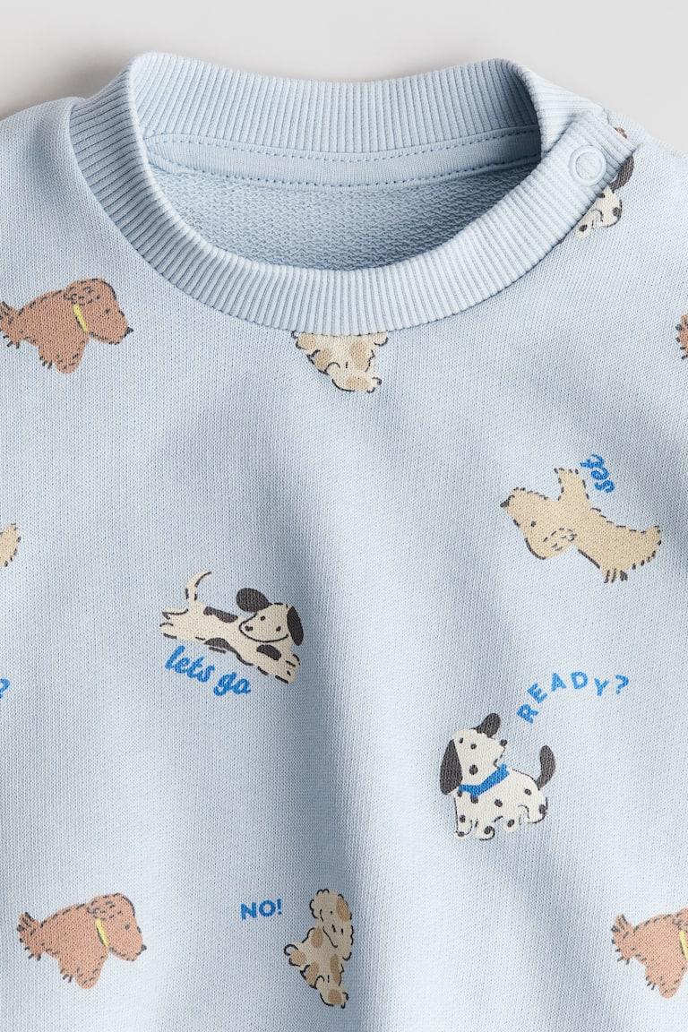 H&M Sweatshirt mit Print Sonderangebot