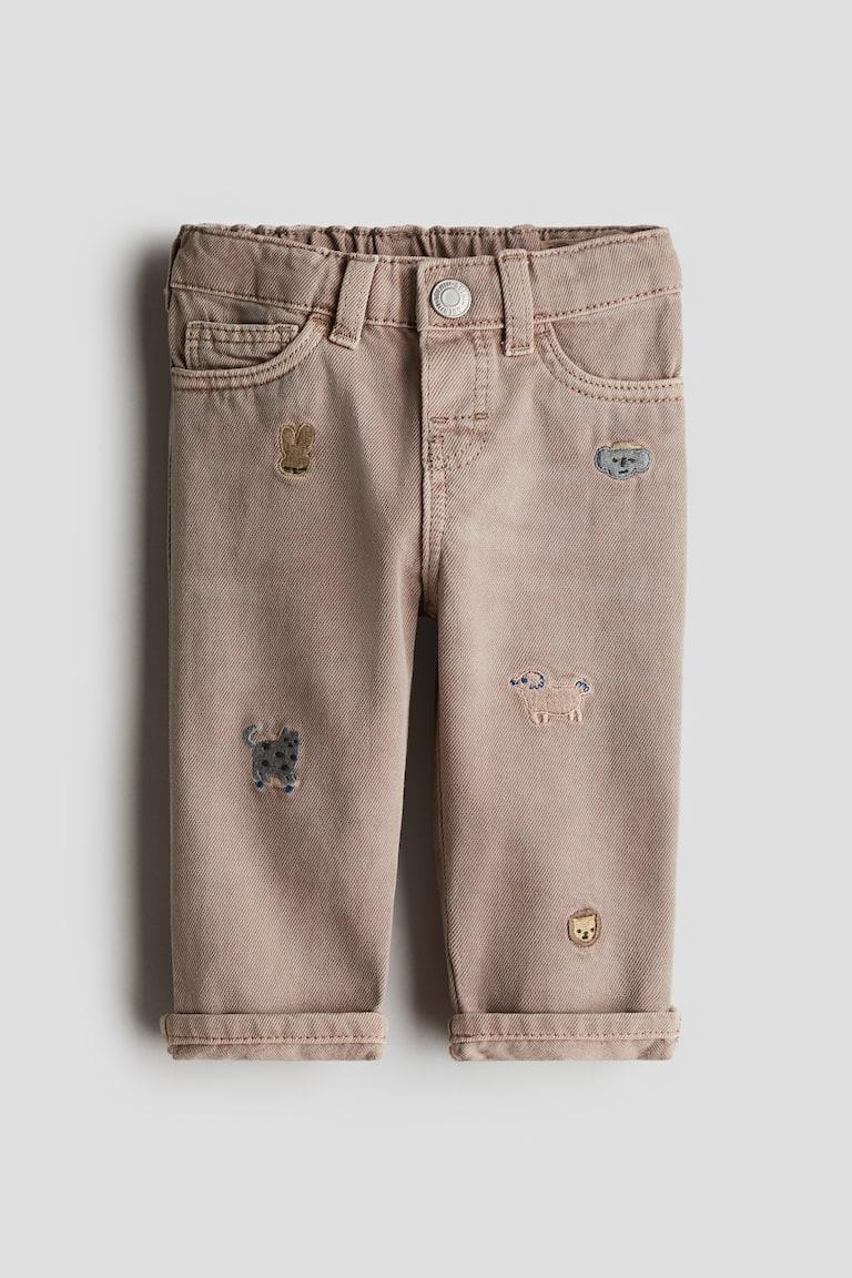 H&M Jeans mit Stickereien Großer Ausverkauf