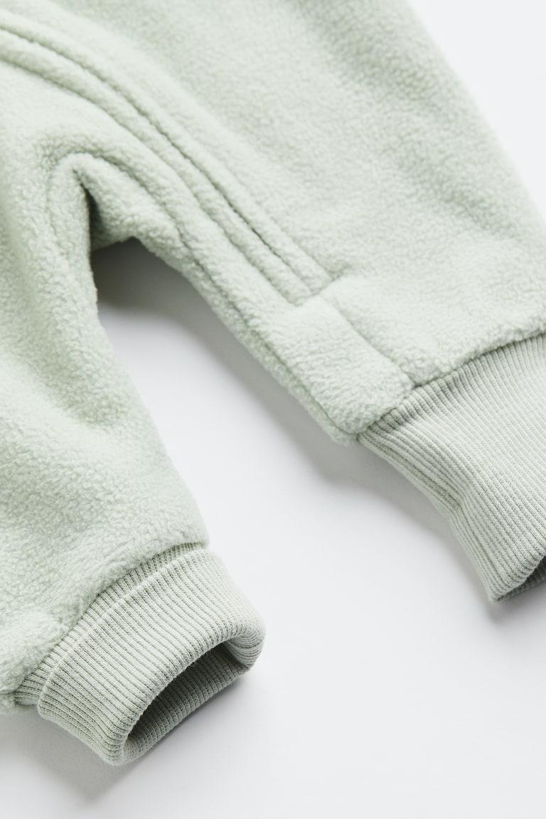 H&M Fleece-Overall mit Kapuze Neueste Stile
