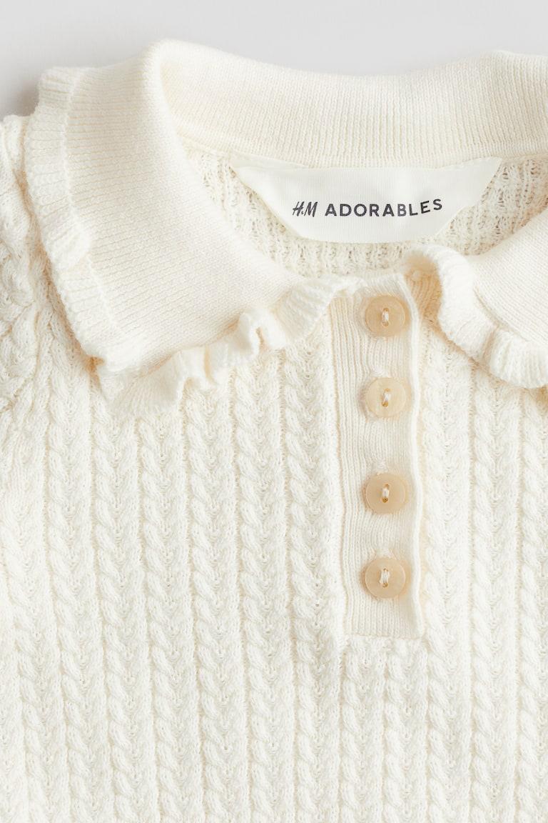 H&M Baumwollshirt aus Zopfstrick Große Rabatte
