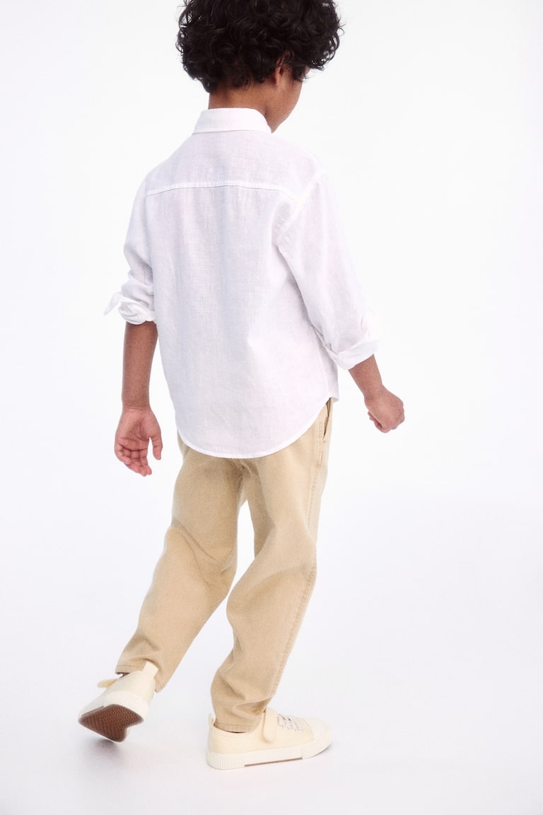 H&M Loose-fit tapered twill chinos Sonderangebote
