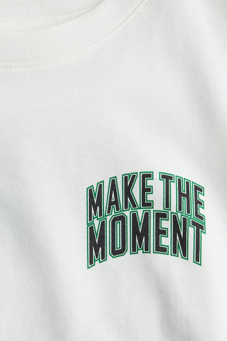H&M T-Shirt mit Print Vierteljährliche Förderung