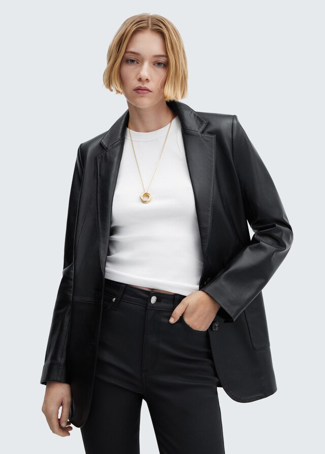 Mango Skinny Coated-Jeans mit hohem Bund Im Verkauf